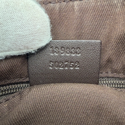 https://cdn.shopify.com/s/files/1/0564/9376/8855/files/Gucci_Schultertasche_D-Ring_large_monogram_beige_vintage_GG_0733.webp?v=1772111450