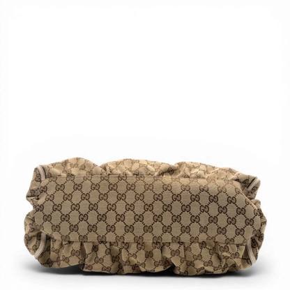 https://cdn.shopify.com/s/files/1/0564/9376/8855/files/Gucci_Schultertasche_D-Ring_large_monogram_beige_vintage_GG_1495.webp?v=1772707096