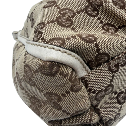 https://cdn.shopify.com/s/files/1/0564/9376/8855/files/Gucci_Schultertasche_D-Ring_large_monogram_beige_vintage_GG_1497.webp?v=1772707096