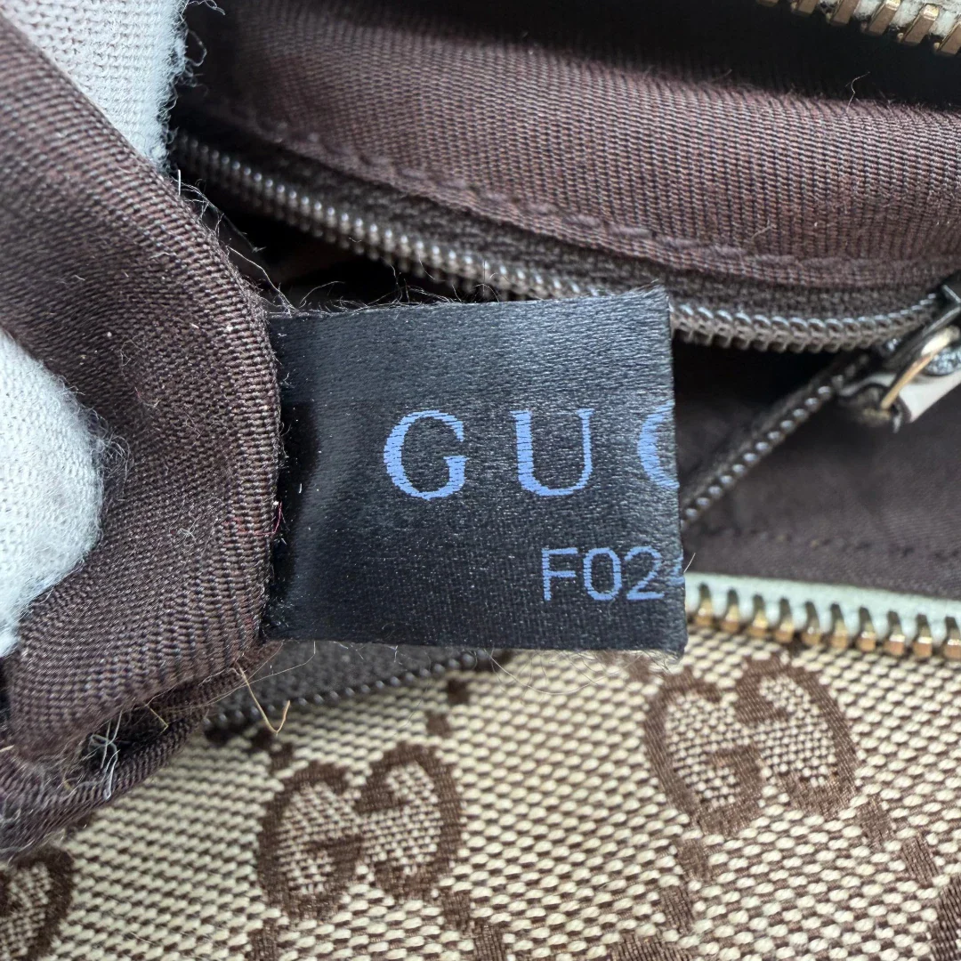 https://cdn.shopify.com/s/files/1/0564/9376/8855/files/Gucci_Schultertasche_D-Ring_large_monogram_beige_vintage_GG_1508.webp?v=1772707096