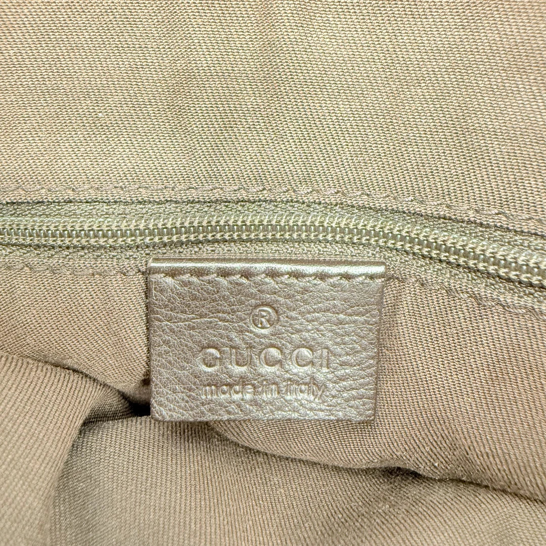 https://cdn.shopify.com/s/files/1/0564/9376/8855/files/Gucci_Schultertasche_D-Ring_large_monogram_beige_vintage_GG_1810.webp?v=1772110934