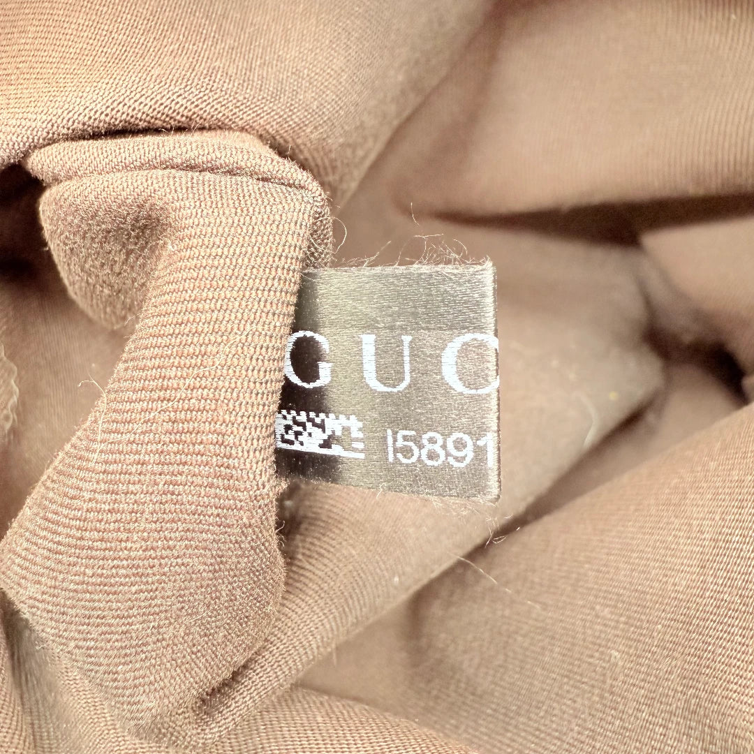 https://cdn.shopify.com/s/files/1/0564/9376/8855/files/Gucci_Schultertasche_D-Ring_large_monogram_beige_vintage_GG_1813.webp?v=1772110934