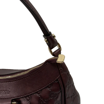 https://cdn.shopify.com/s/files/1/0564/9376/8855/files/Gucci_Schultertasche_D-Ring_medium_aus_Leder_monogram_lila_13.webp?v=1784283698