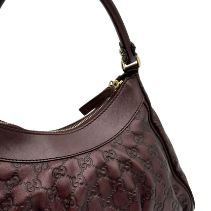 https://cdn.shopify.com/s/files/1/0564/9376/8855/files/Gucci_Schultertasche_D-Ring_medium_aus_Leder_monogram_lila_15.webp?v=1784283699