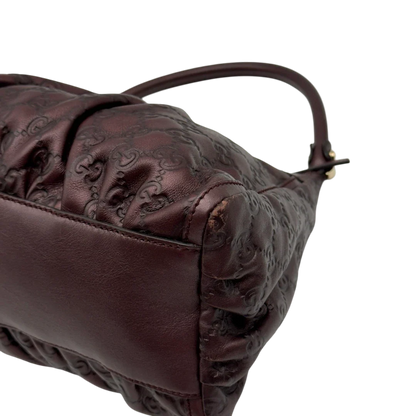 https://cdn.shopify.com/s/files/1/0564/9376/8855/files/Gucci_Schultertasche_D-Ring_medium_aus_Leder_monogram_lila_8.webp?v=1784283698