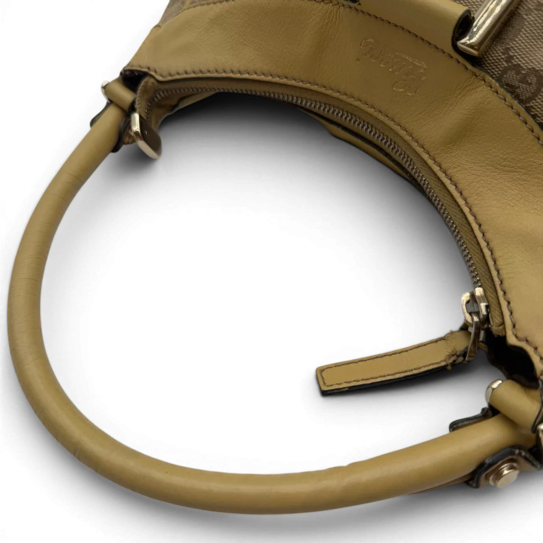 https://cdn.shopify.com/s/files/1/0564/9376/8855/files/Gucci_Schultertasche_D-Ring_medium_monogram_beige_10.webp?v=1782378063