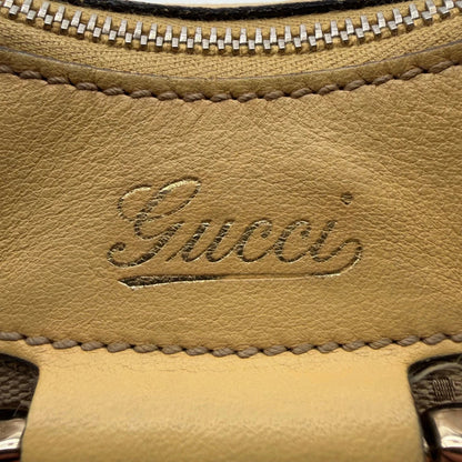 https://cdn.shopify.com/s/files/1/0564/9376/8855/files/Gucci_Schultertasche_D-Ring_medium_monogram_beige_11.webp?v=1782378063