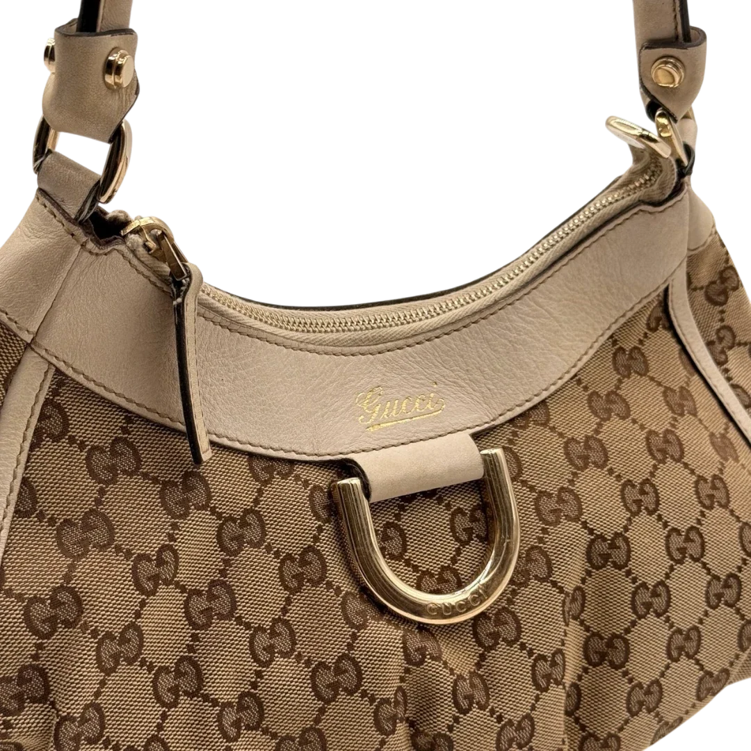 https://cdn.shopify.com/s/files/1/0564/9376/8855/files/Gucci_Schultertasche_D-Ring_medium_monogram_beige_11_b07a9de3-8954-4f46-aab1-8d0d36194c5f.webp?v=1784803468
