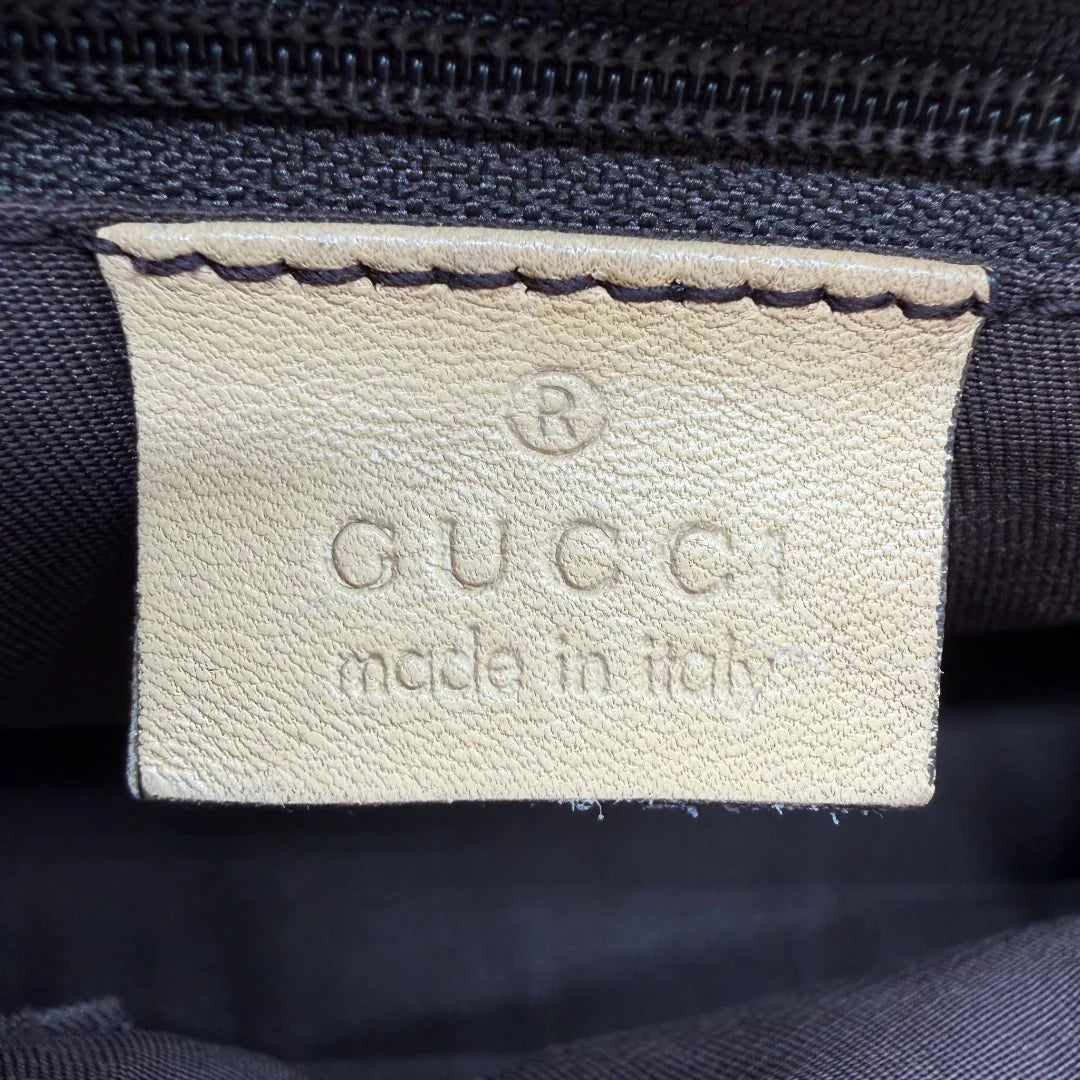 https://cdn.shopify.com/s/files/1/0564/9376/8855/files/Gucci_Schultertasche_D-Ring_medium_monogram_beige_16.webp?v=1782378063