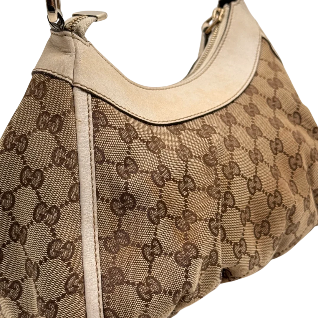 https://cdn.shopify.com/s/files/1/0564/9376/8855/files/Gucci_Schultertasche_D-Ring_medium_monogram_beige_16_06d2be28-a791-472c-bbfb-f540c7f2e012.webp?v=1784803468