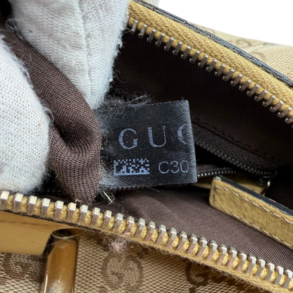 https://cdn.shopify.com/s/files/1/0564/9376/8855/files/Gucci_Schultertasche_D-Ring_medium_monogram_beige_18.webp?v=1782378063