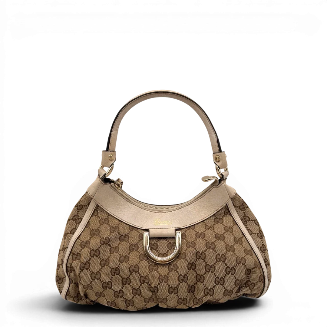 https://cdn.shopify.com/s/files/1/0564/9376/8855/files/Gucci_Schultertasche_D-Ring_medium_monogram_beige_1_30857a35-1ddf-4eaa-add3-d571ee61fab4.webp?v=1784803467