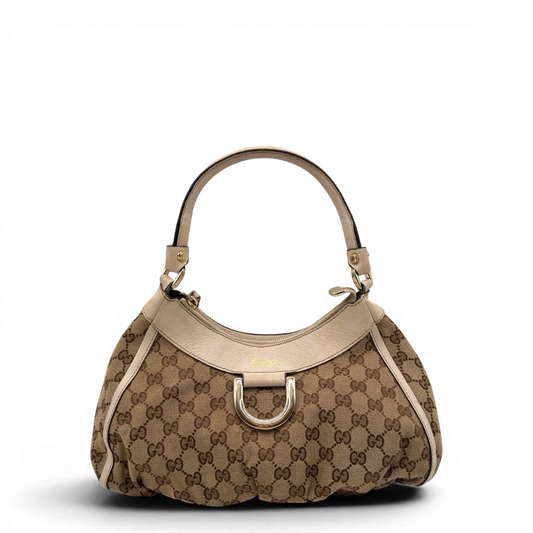 https://cdn.shopify.com/s/files/1/0564/9376/8855/files/Gucci_Schultertasche_D-Ring_medium_monogram_beige_1_30857a35-1ddf-4eaa-add3-d571ee61fab4.webp?v=1784803467