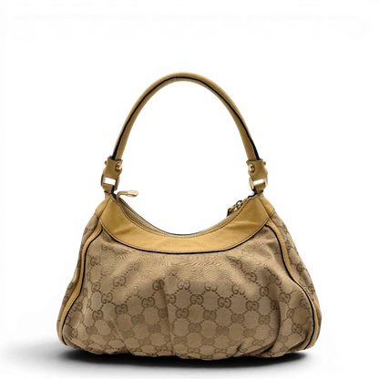 https://cdn.shopify.com/s/files/1/0564/9376/8855/files/Gucci_Schultertasche_D-Ring_medium_monogram_beige_2.webp?v=1782378063