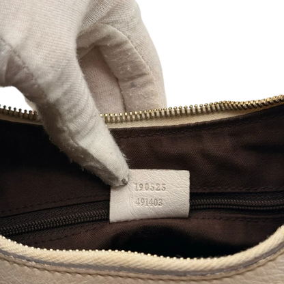 https://cdn.shopify.com/s/files/1/0564/9376/8855/files/Gucci_Schultertasche_D-Ring_medium_monogram_beige_22.webp?v=1784803467