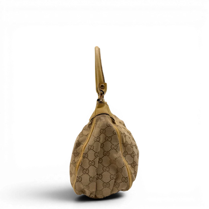 https://cdn.shopify.com/s/files/1/0564/9376/8855/files/Gucci_Schultertasche_D-Ring_medium_monogram_beige_3.webp?v=1782378062