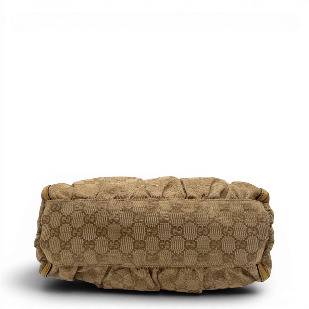 https://cdn.shopify.com/s/files/1/0564/9376/8855/files/Gucci_Schultertasche_D-Ring_medium_monogram_beige_5.webp?v=1782378063
