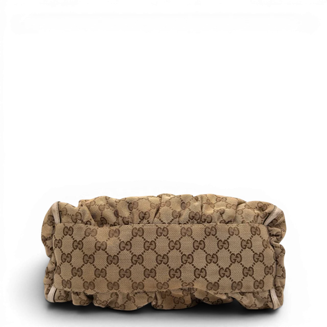 https://cdn.shopify.com/s/files/1/0564/9376/8855/files/Gucci_Schultertasche_D-Ring_medium_monogram_beige_5_d64c3b31-629e-4f07-bf14-1bf98442d27f.webp?v=1784803467