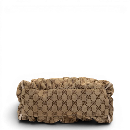 https://cdn.shopify.com/s/files/1/0564/9376/8855/files/Gucci_Schultertasche_D-Ring_medium_monogram_beige_5_d64c3b31-629e-4f07-bf14-1bf98442d27f.webp?v=1784803467