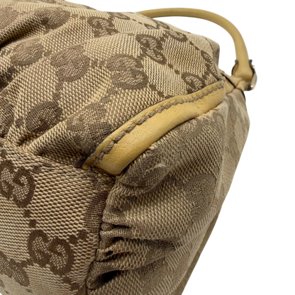 https://cdn.shopify.com/s/files/1/0564/9376/8855/files/Gucci_Schultertasche_D-Ring_medium_monogram_beige_6.webp?v=1782378063
