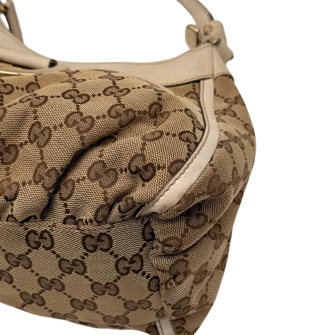 https://cdn.shopify.com/s/files/1/0564/9376/8855/files/Gucci_Schultertasche_D-Ring_medium_monogram_beige_6_63675442-f132-4d49-a927-1e0a70ba6bd2.webp?v=1784803467
