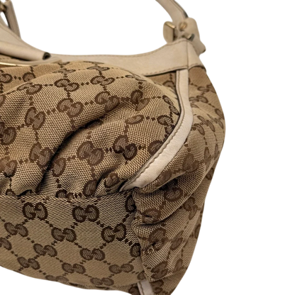 https://cdn.shopify.com/s/files/1/0564/9376/8855/files/Gucci_Schultertasche_D-Ring_medium_monogram_beige_6_63675442-f132-4d49-a927-1e0a70ba6bd2.webp?v=1784803467