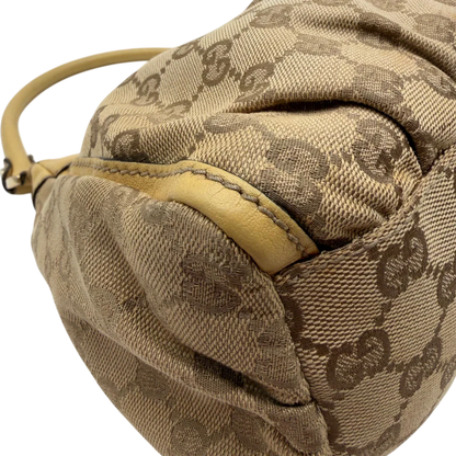 https://cdn.shopify.com/s/files/1/0564/9376/8855/files/Gucci_Schultertasche_D-Ring_medium_monogram_beige_7.webp?v=1782378064