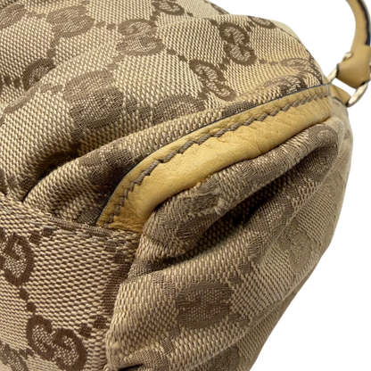 https://cdn.shopify.com/s/files/1/0564/9376/8855/files/Gucci_Schultertasche_D-Ring_medium_monogram_beige_8.webp?v=1782378064