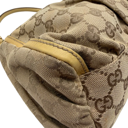 https://cdn.shopify.com/s/files/1/0564/9376/8855/files/Gucci_Schultertasche_D-Ring_medium_monogram_beige_9.webp?v=1782378064