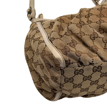 https://cdn.shopify.com/s/files/1/0564/9376/8855/files/Gucci_Schultertasche_D-Ring_medium_monogram_beige_9_7e5b26f7-5428-4d84-b255-7cd81ffda815.webp?v=1784803467