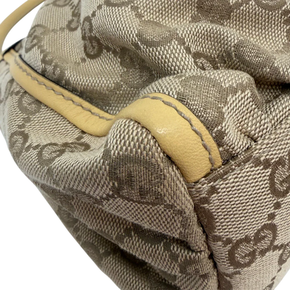 https://cdn.shopify.com/s/files/1/0564/9376/8855/files/Gucci_Schultertasche_D-Ring_medium_monogram_beige_vintage_GG6902.webp?v=1779286243
