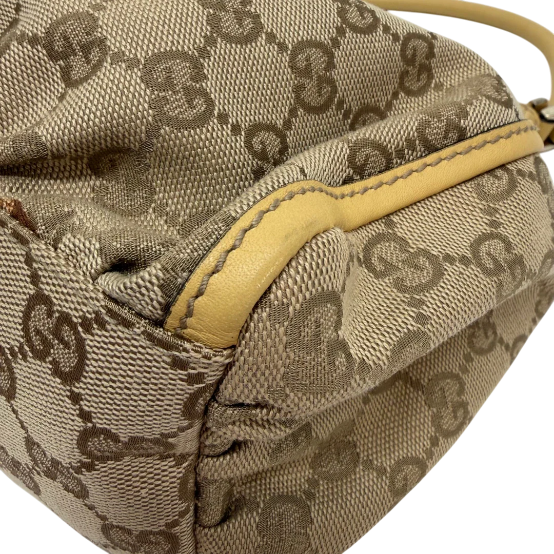https://cdn.shopify.com/s/files/1/0564/9376/8855/files/Gucci_Schultertasche_D-Ring_medium_monogram_beige_vintage_GG6903.webp?v=1779286244
