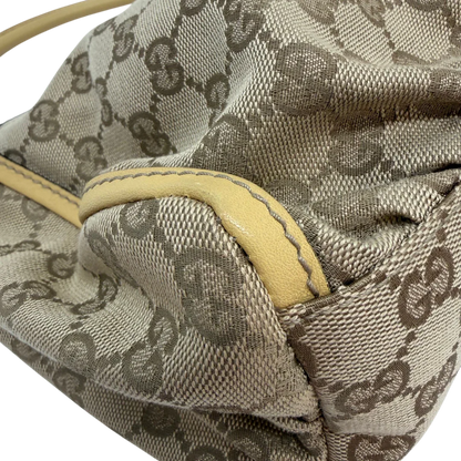https://cdn.shopify.com/s/files/1/0564/9376/8855/files/Gucci_Schultertasche_D-Ring_medium_monogram_beige_vintage_GG6905.webp?v=1779286243
