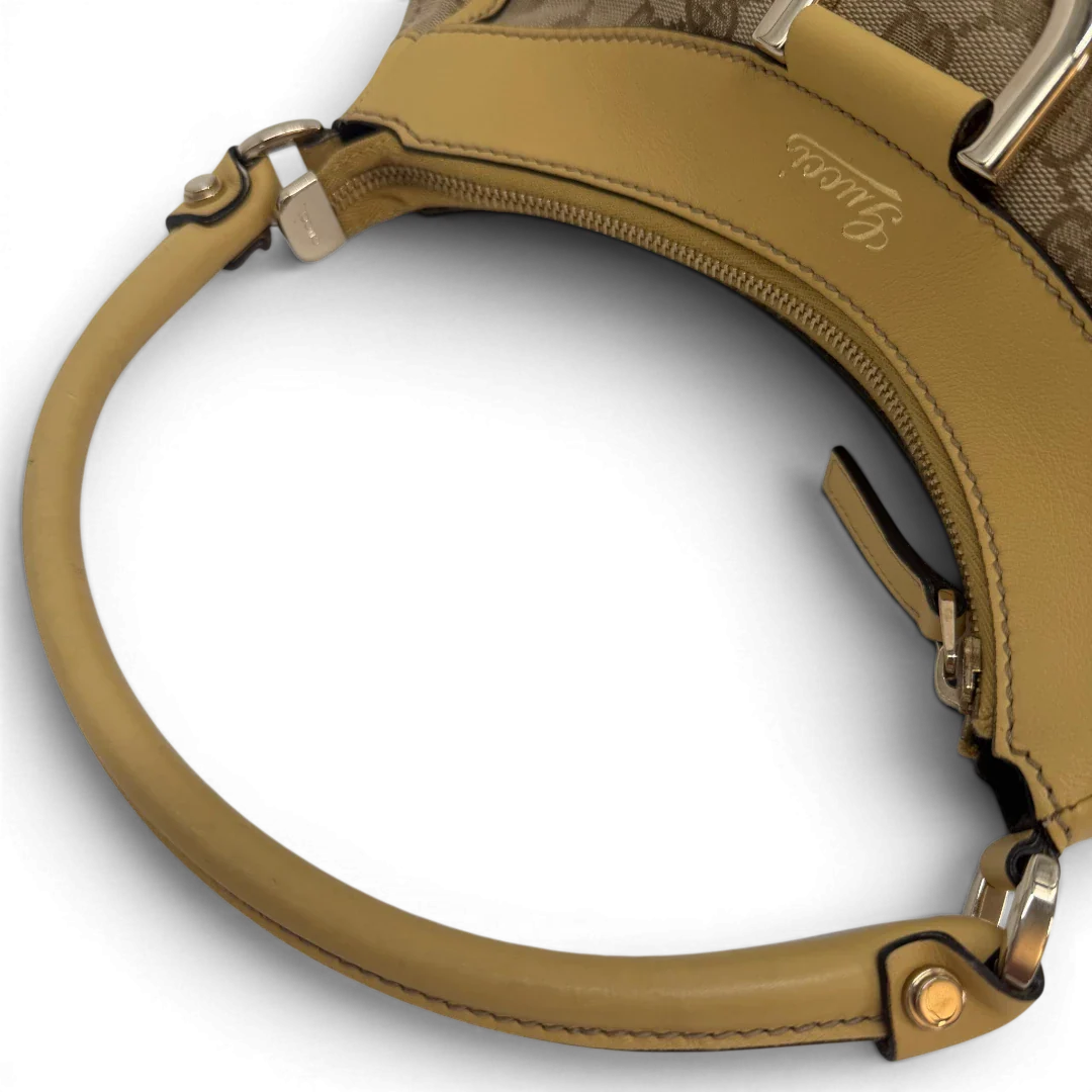https://cdn.shopify.com/s/files/1/0564/9376/8855/files/Gucci_Schultertasche_D-Ring_medium_monogram_beige_vintage_GG6906.webp?v=1779286243