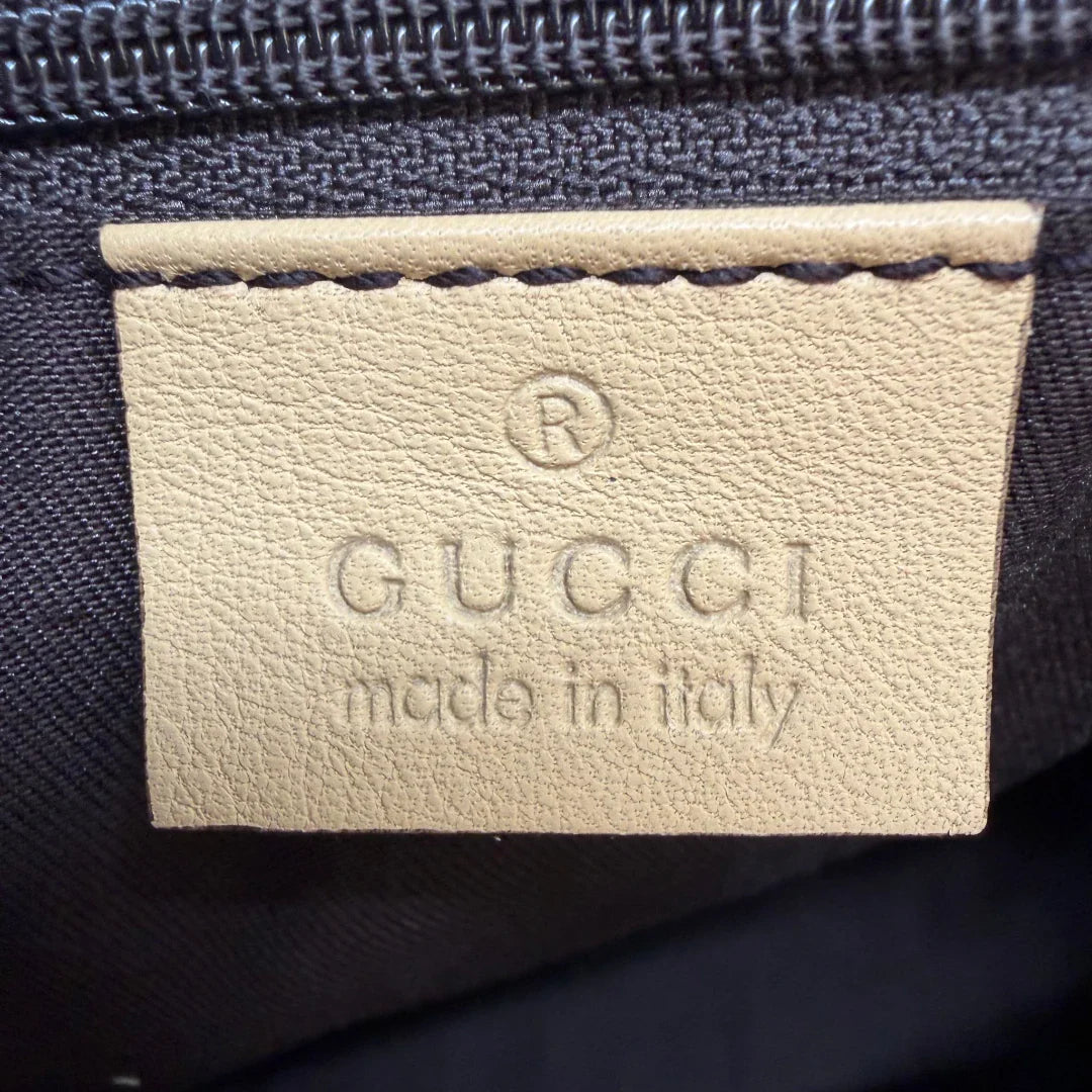 https://cdn.shopify.com/s/files/1/0564/9376/8855/files/Gucci_Schultertasche_D-Ring_medium_monogram_beige_vintage_GG6911.webp?v=1779286243