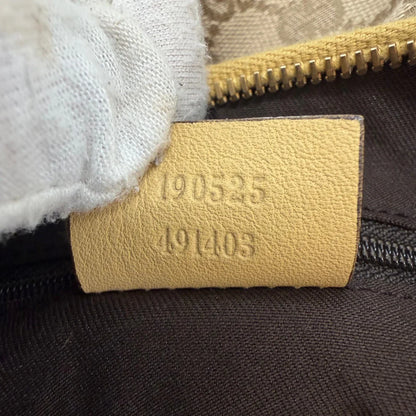 https://cdn.shopify.com/s/files/1/0564/9376/8855/files/Gucci_Schultertasche_D-Ring_medium_monogram_beige_vintage_GG6912.webp?v=1779286243