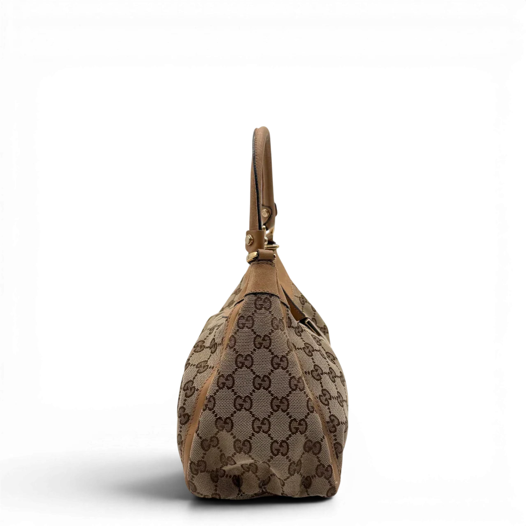https://cdn.shopify.com/s/files/1/0564/9376/8855/files/Gucci_Schultertasche_D-Ring_medium_monogram_beige_vintage_GG8414.webp?v=1781108709
