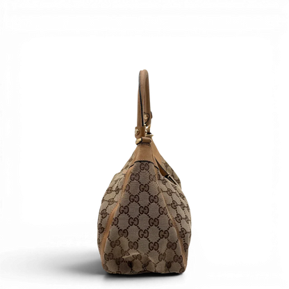 https://cdn.shopify.com/s/files/1/0564/9376/8855/files/Gucci_Schultertasche_D-Ring_medium_monogram_beige_vintage_GG8414.webp?v=1781108709