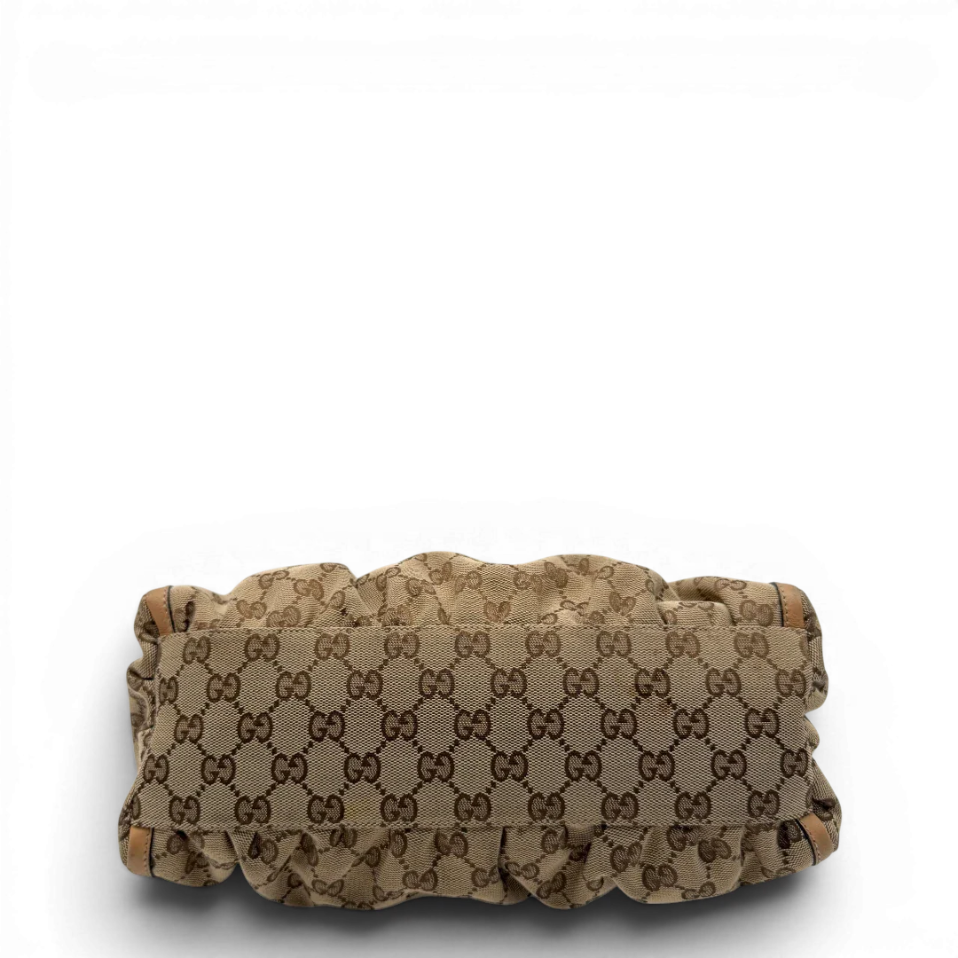 https://cdn.shopify.com/s/files/1/0564/9376/8855/files/Gucci_Schultertasche_D-Ring_medium_monogram_beige_vintage_GG8415.webp?v=1781108709