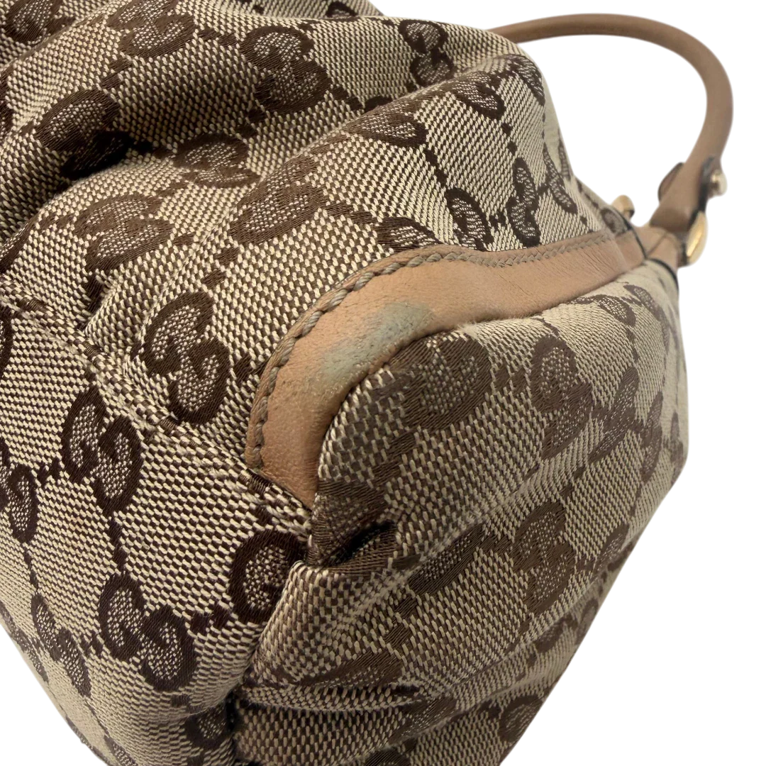 https://cdn.shopify.com/s/files/1/0564/9376/8855/files/Gucci_Schultertasche_D-Ring_medium_monogram_beige_vintage_GG8416.webp?v=1781108709