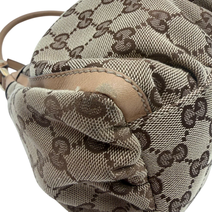 https://cdn.shopify.com/s/files/1/0564/9376/8855/files/Gucci_Schultertasche_D-Ring_medium_monogram_beige_vintage_GG8417.webp?v=1781108709