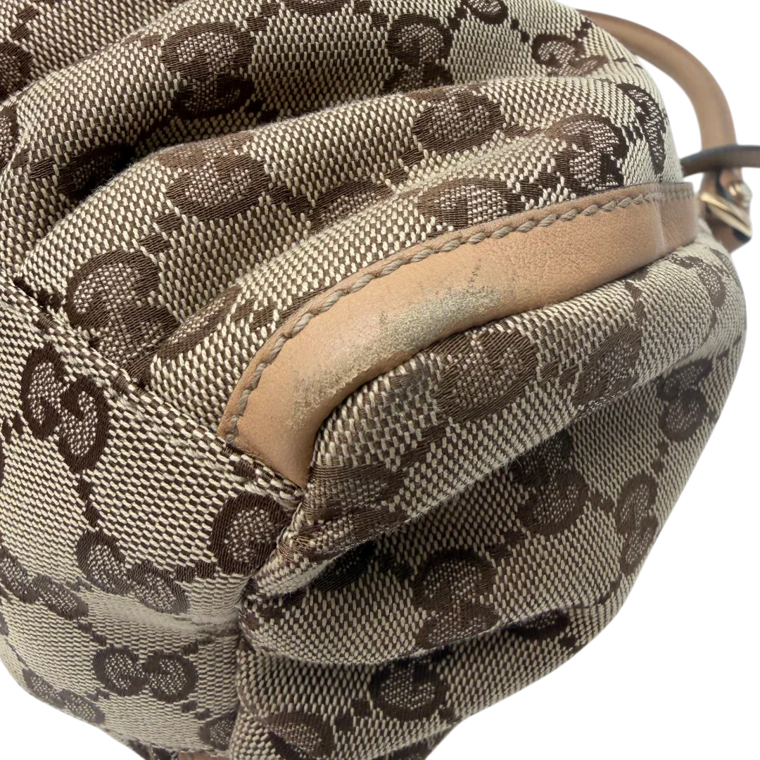 https://cdn.shopify.com/s/files/1/0564/9376/8855/files/Gucci_Schultertasche_D-Ring_medium_monogram_beige_vintage_GG8418.webp?v=1781108709
