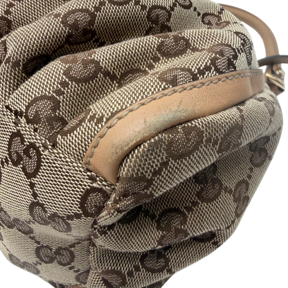 https://cdn.shopify.com/s/files/1/0564/9376/8855/files/Gucci_Schultertasche_D-Ring_medium_monogram_beige_vintage_GG8418.webp?v=1781108709