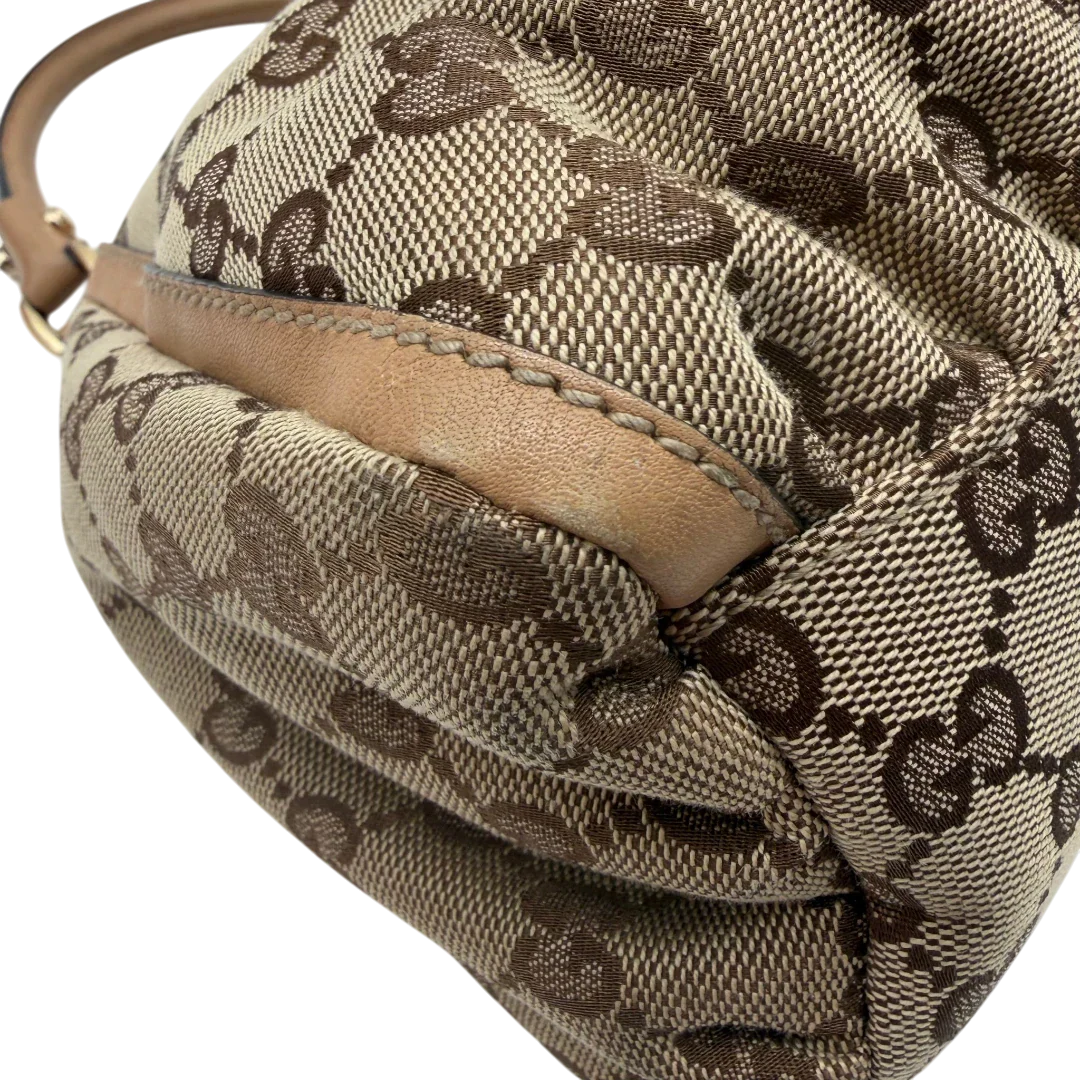 https://cdn.shopify.com/s/files/1/0564/9376/8855/files/Gucci_Schultertasche_D-Ring_medium_monogram_beige_vintage_GG8419.webp?v=1781108709