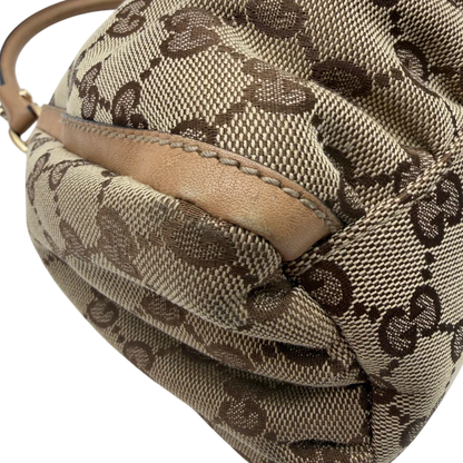 https://cdn.shopify.com/s/files/1/0564/9376/8855/files/Gucci_Schultertasche_D-Ring_medium_monogram_beige_vintage_GG8419.webp?v=1781108709