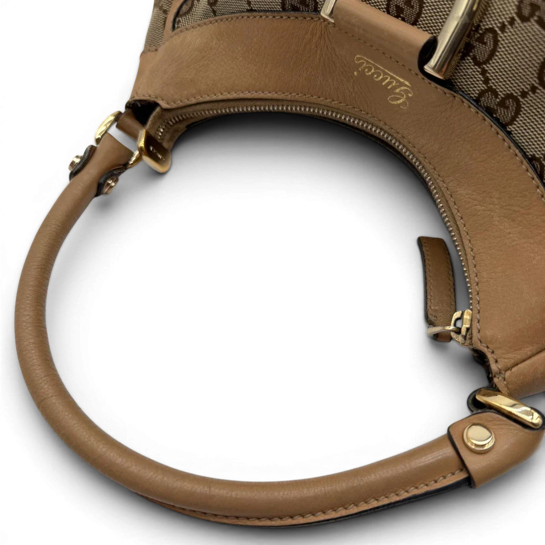 https://cdn.shopify.com/s/files/1/0564/9376/8855/files/Gucci_Schultertasche_D-Ring_medium_monogram_beige_vintage_GG8420.webp?v=1781108709