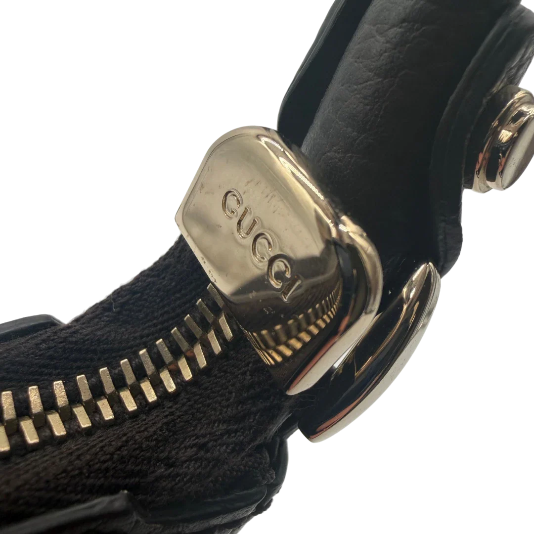 https://cdn.shopify.com/s/files/1/0564/9376/8855/files/Gucci_Schultertasche_D-Ring_medium_monogram_schwarz_vintage_GG6067.webp?v=1778081933