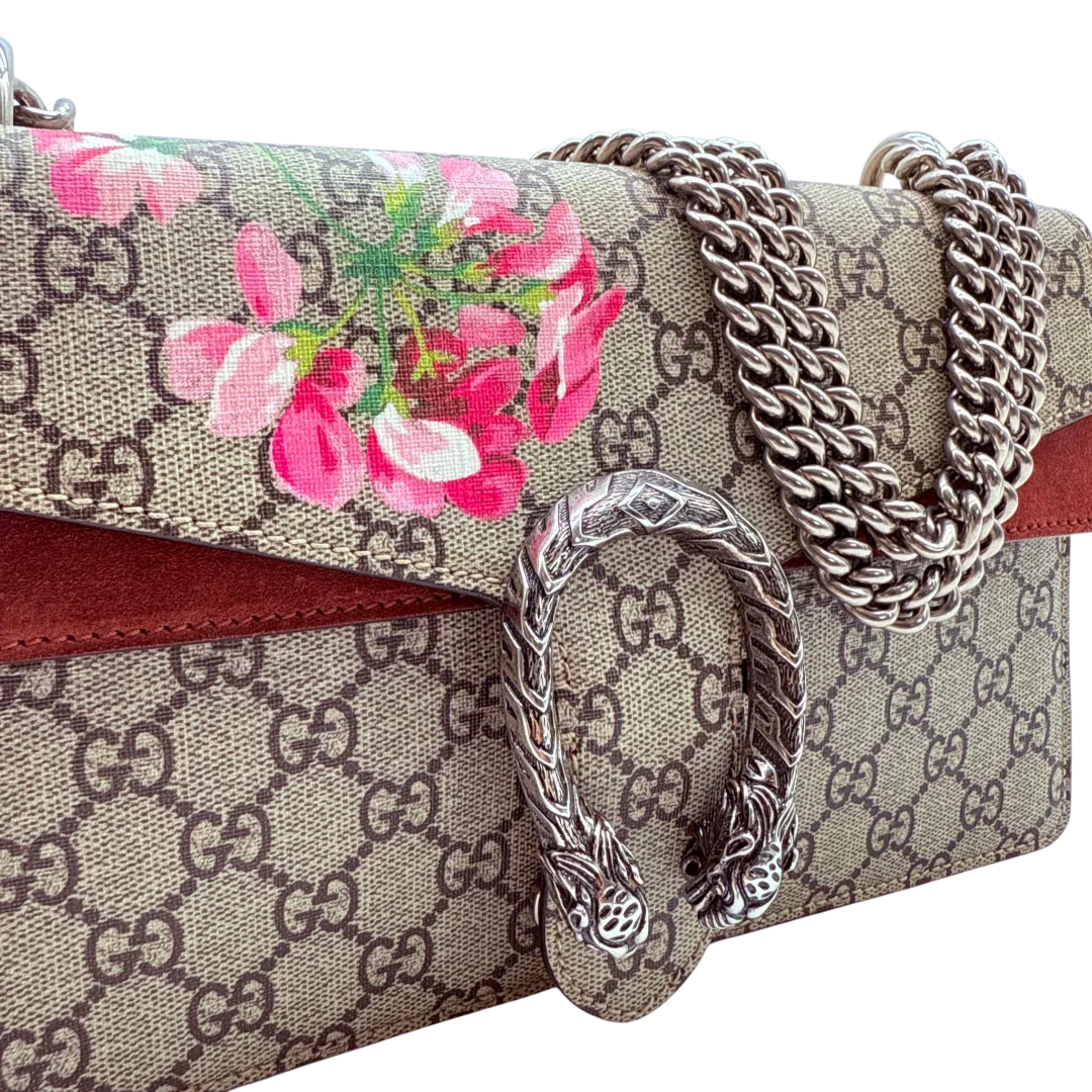 https://cdn.shopify.com/s/files/1/0564/9376/8855/files/Gucci_Schultertasche_Dionysus_Medium_Floral_monogram_beige_vintage_GG2643.webp?v=1773317843