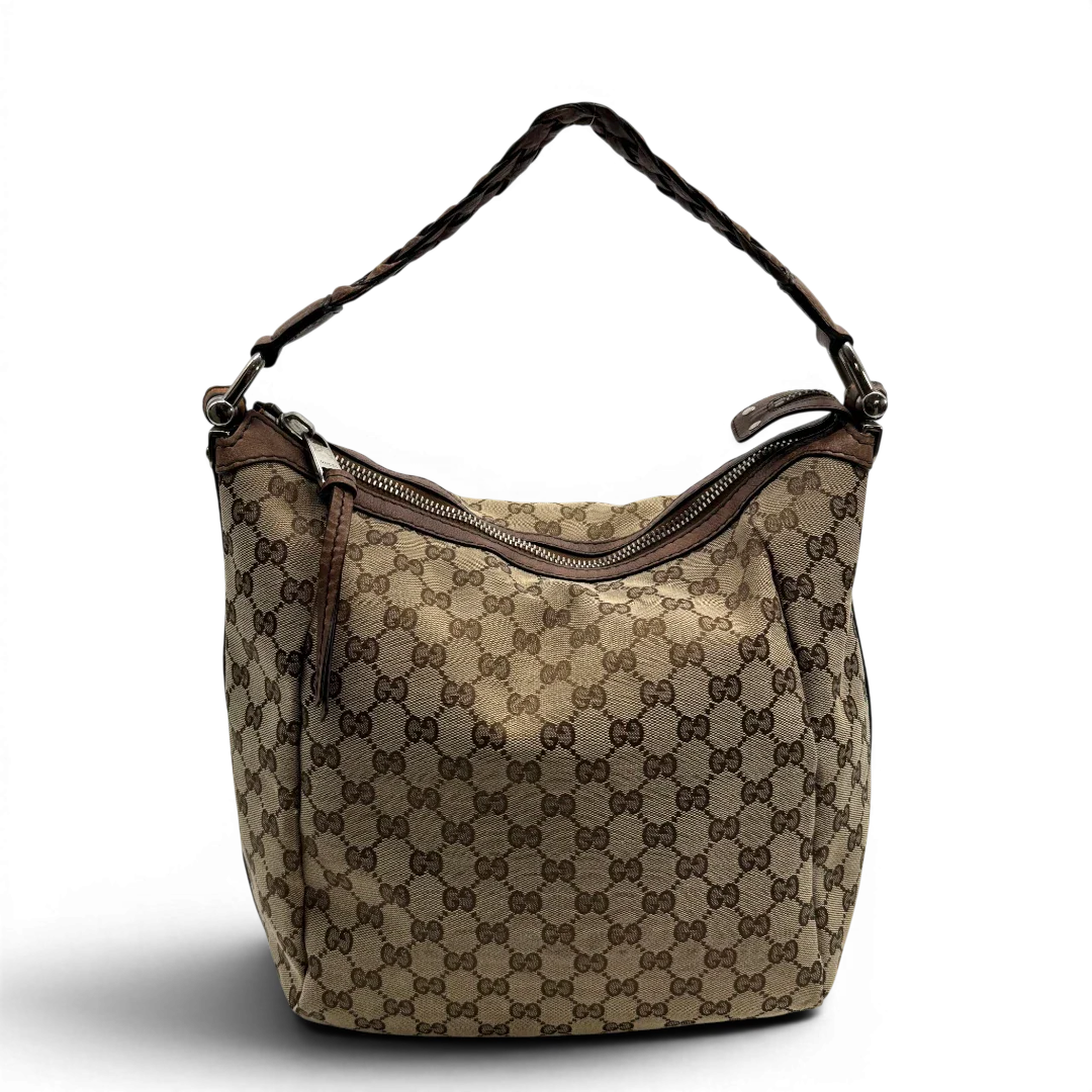 https://cdn.shopify.com/s/files/1/0564/9376/8855/files/Gucci_Schultertasche_Hobo_Bamboo_monogram_beige_vintage_GG2283.webp?v=1779968857