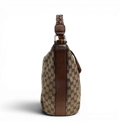 https://cdn.shopify.com/s/files/1/0564/9376/8855/files/Gucci_Schultertasche_Hobo_Bamboo_monogram_beige_vintage_GG2284.webp?v=1779968856